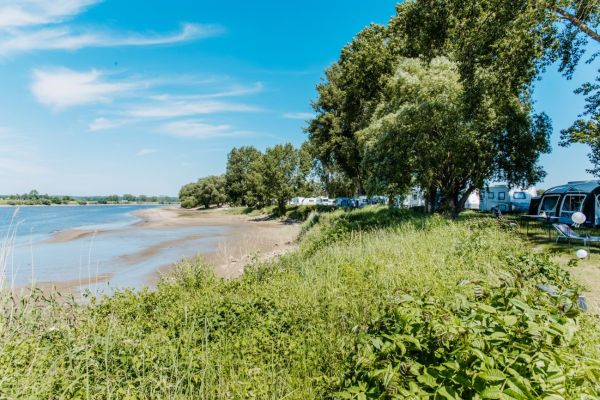 Multiple motorhomes at the caravan park at the Stover Strand campsite near Hamburg. 