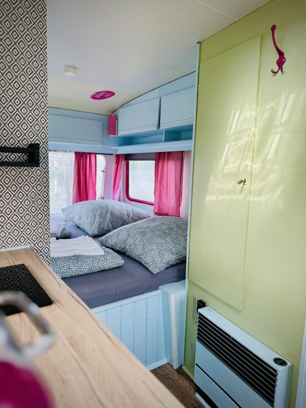 Double bed in beach camper at the Stover Strand camping pitch near Hamburg Elbe