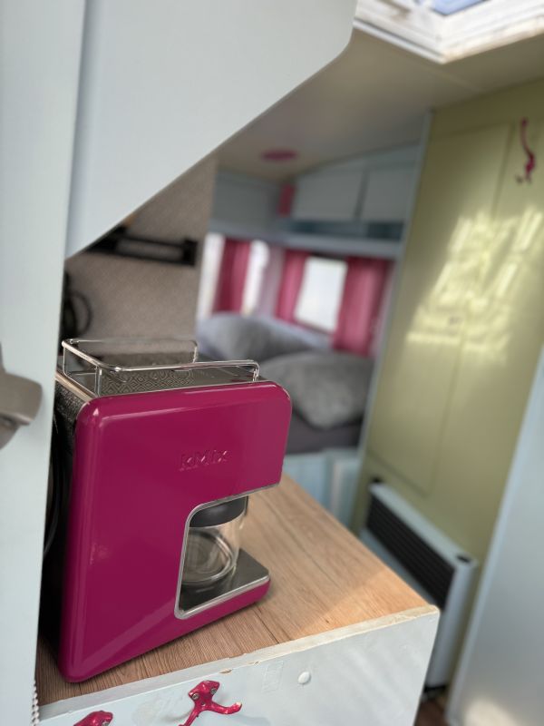 Retro beach camper with indoor kitchen at Stover caravan park near Hamburg