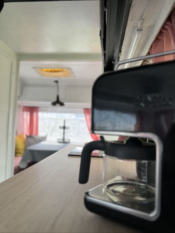 Retro camper with coffee maker for Elbe camping near Hamburg