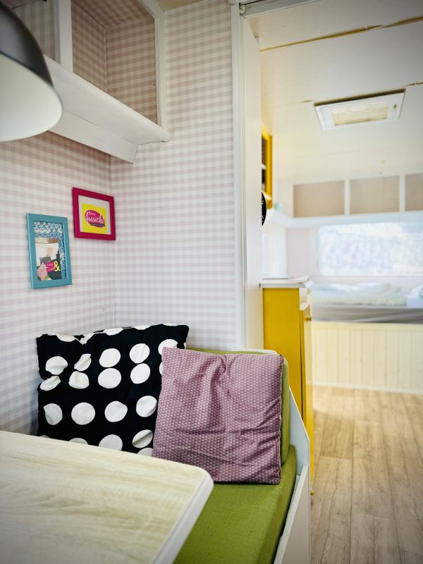 Retro camper Petronella Citronella with an indoor sitting area for Elbe Camping