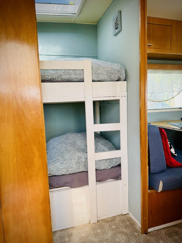 Retro camper with bunk beds at the Stover Strand campsite near Hamburg