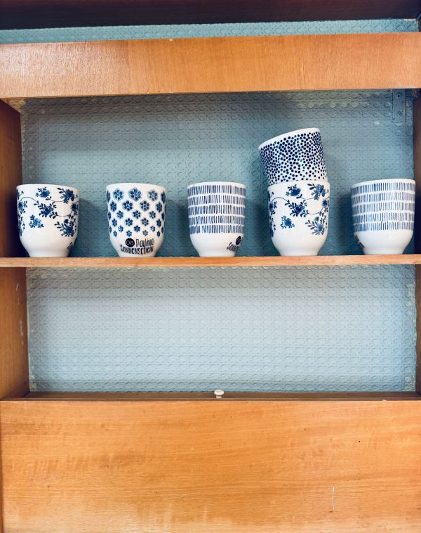 Retro Camper with equipment for camping at Stover Strand Camping near Hamburg