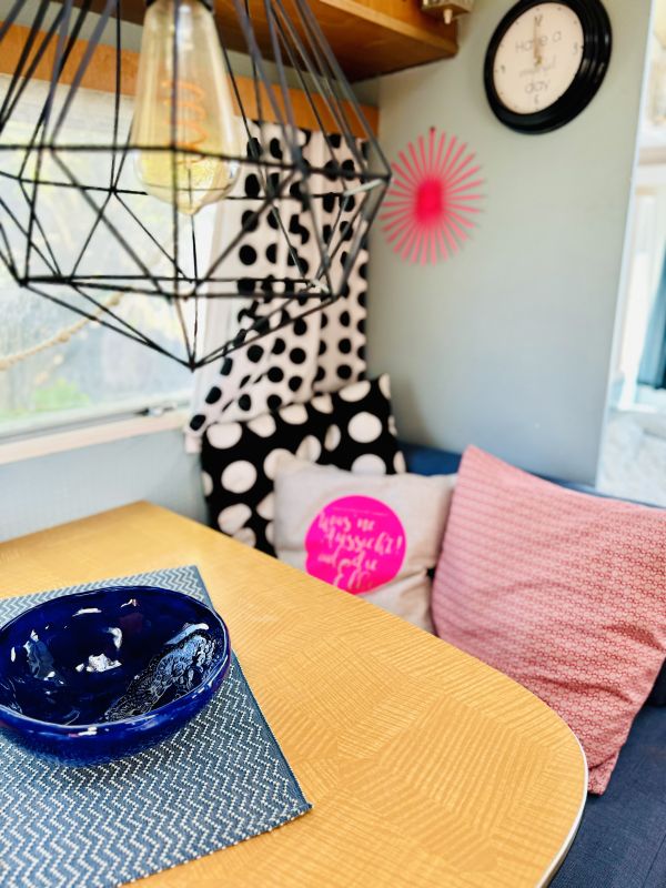 Retro Camper with colorful design at Stover Strand camping near Hamburg