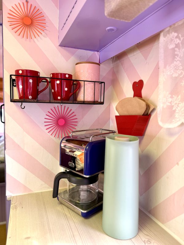 caravan with kitchen and coffee maker at the Stover Strand campsite near Hamburg