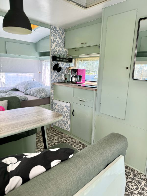 Retro camper with green interior at the Stover Strand campsite near Hamburg